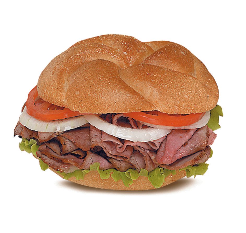 Charcoal Grill pit beef sandwich with lettuce, tomato and onion